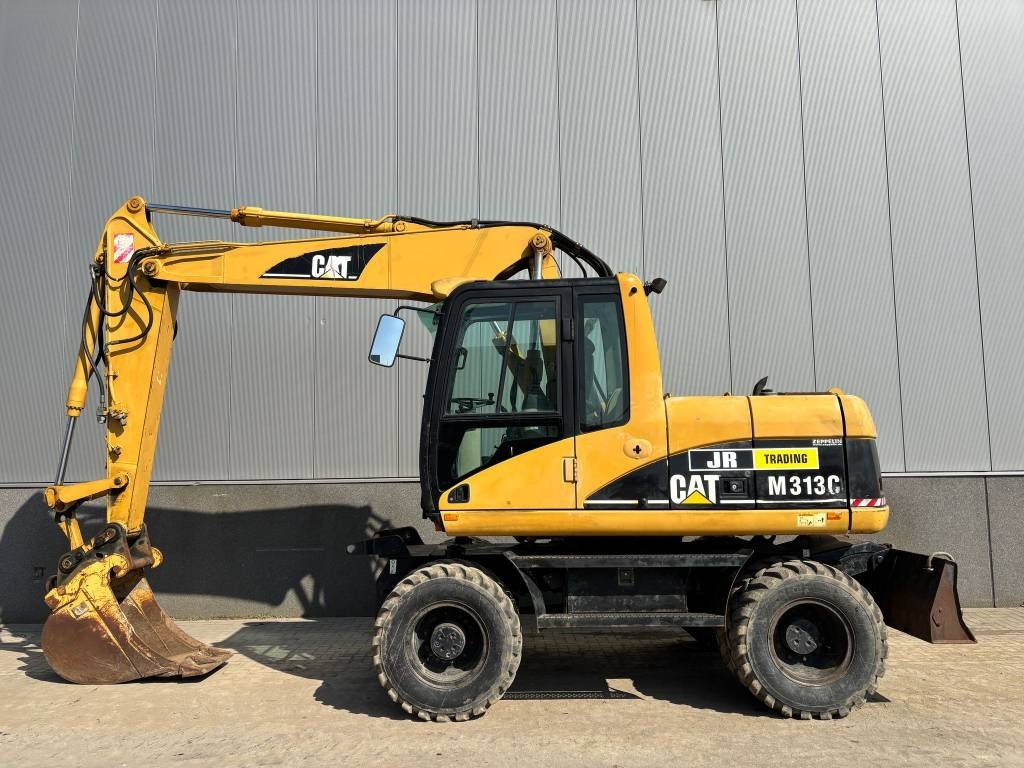 CAT M 313 C (Low verified hours) - Excavadora de ruedas: foto 1 CAT M 313 C (Low verified hours) - Excavadora de ruedas: foto 1