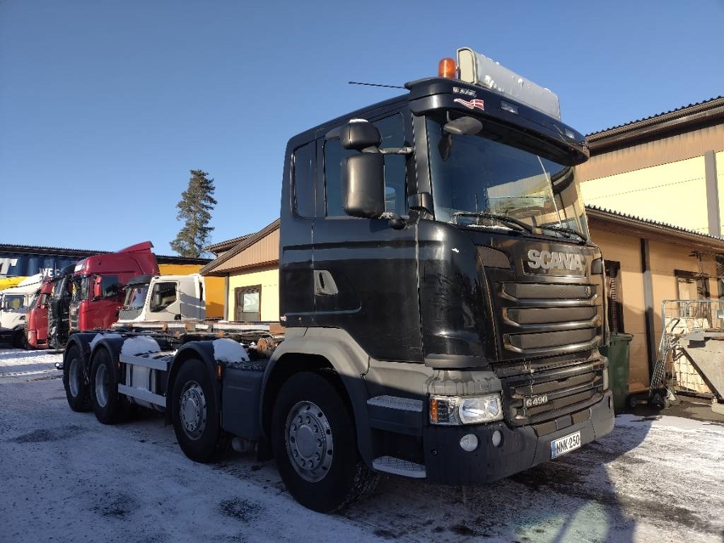 Scania R490 8x4 vaijerilaite,Euro6 - Camión portacontenedor de cadenas: foto 1 Scania R490 8x4 vaijerilaite,Euro6 - Camión portacontenedor de cadenas: foto 1