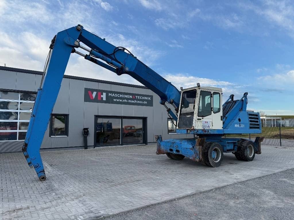 Fuchs MHL 331 - Manipulador de materiales: foto 1 Fuchs MHL 331 - Manipulador de materiales: foto 1