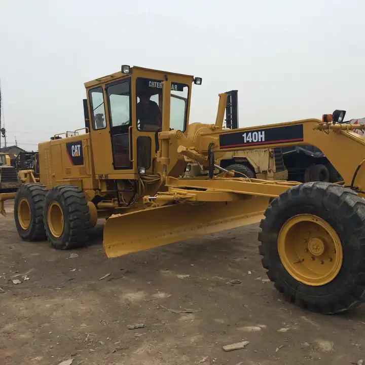 Good Condition Original Japan Used CAT 140H Motor Grader Used 140h CAT 140H used Motor Grader - Grader: foto 1 Good Condition Original Japan Used CAT 140H Motor Grader Used 140h CAT 140H used Motor Grader - Grader: foto 1