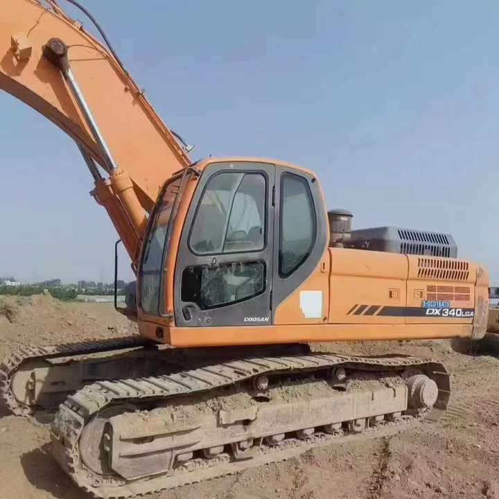 Used Original Korea Doosan 34 Ton Excavator with Cheap Price and Good Condition DOOSAN Dx340LCA Dx225 Dx330 DX360for Sale - Excavadora: foto 1 Used Original Korea Doosan 34 Ton Excavator with Cheap Price and Good Condition DOOSAN Dx340LCA Dx225 Dx330 DX360for Sale - Excavadora: foto 1