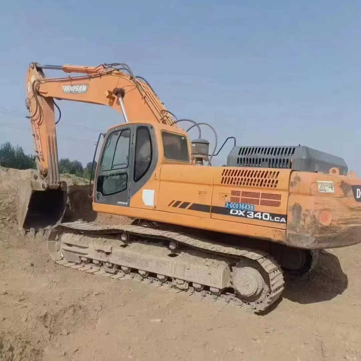 Used Original Korea Doosan 34 Ton Excavator with Cheap Price and Good Condition DOOSAN Dx340LCA Dx225 Dx330 DX360for Sale - Excavadora de cadenas: foto 1 Used Original Korea Doosan 34 Ton Excavator with Cheap Price and Good Condition DOOSAN Dx340LCA Dx225 Dx330 DX360for Sale - Excavadora de cadenas: foto 1