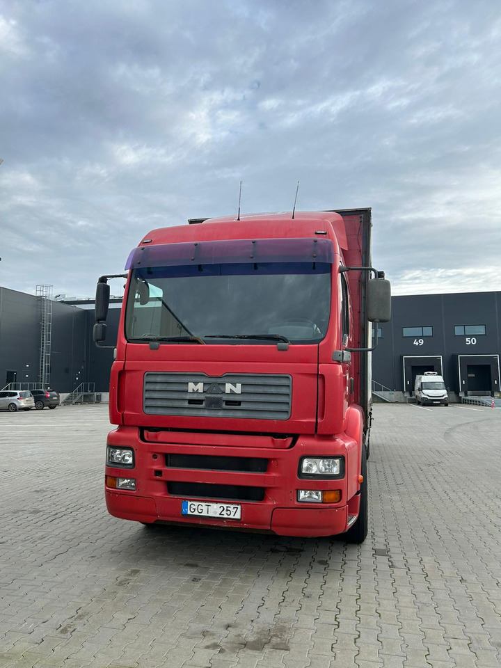 MAN TGA 18.310 - Camión lona: foto 1 MAN TGA 18.310 - Camión lona: foto 1