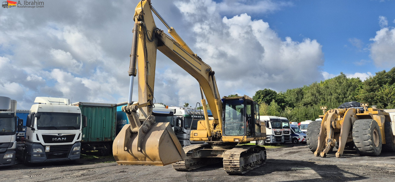 Komatsu PC 210 Zustand gut, UVV 12 25 - Excavadora de cadenas: foto 1 Komatsu PC 210 Zustand gut, UVV 12 25 - Excavadora de cadenas: foto 1