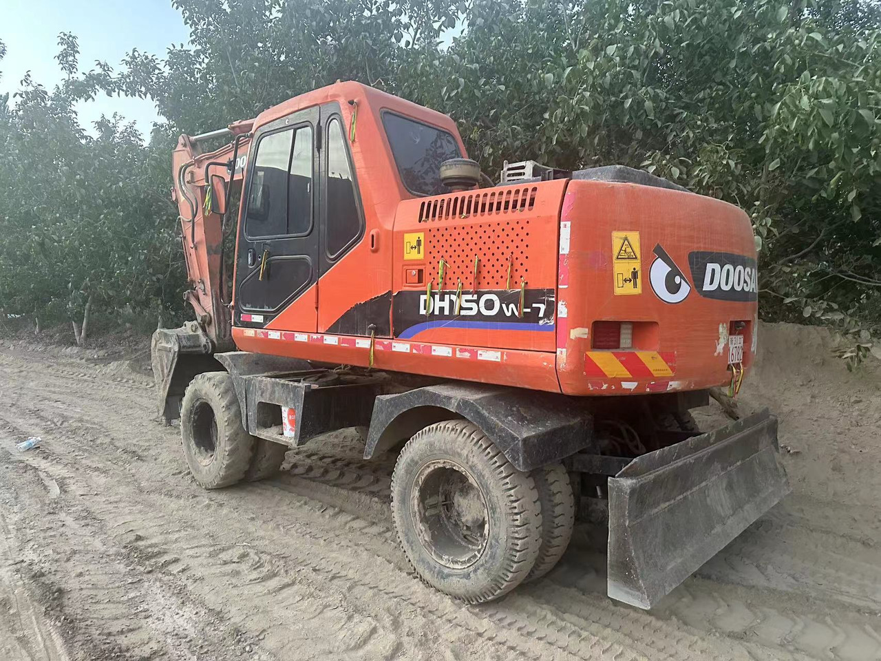 DOOSAN DH150W-7 - Excavadora de ruedas: foto 1 DOOSAN DH150W-7 - Excavadora de ruedas: foto 1