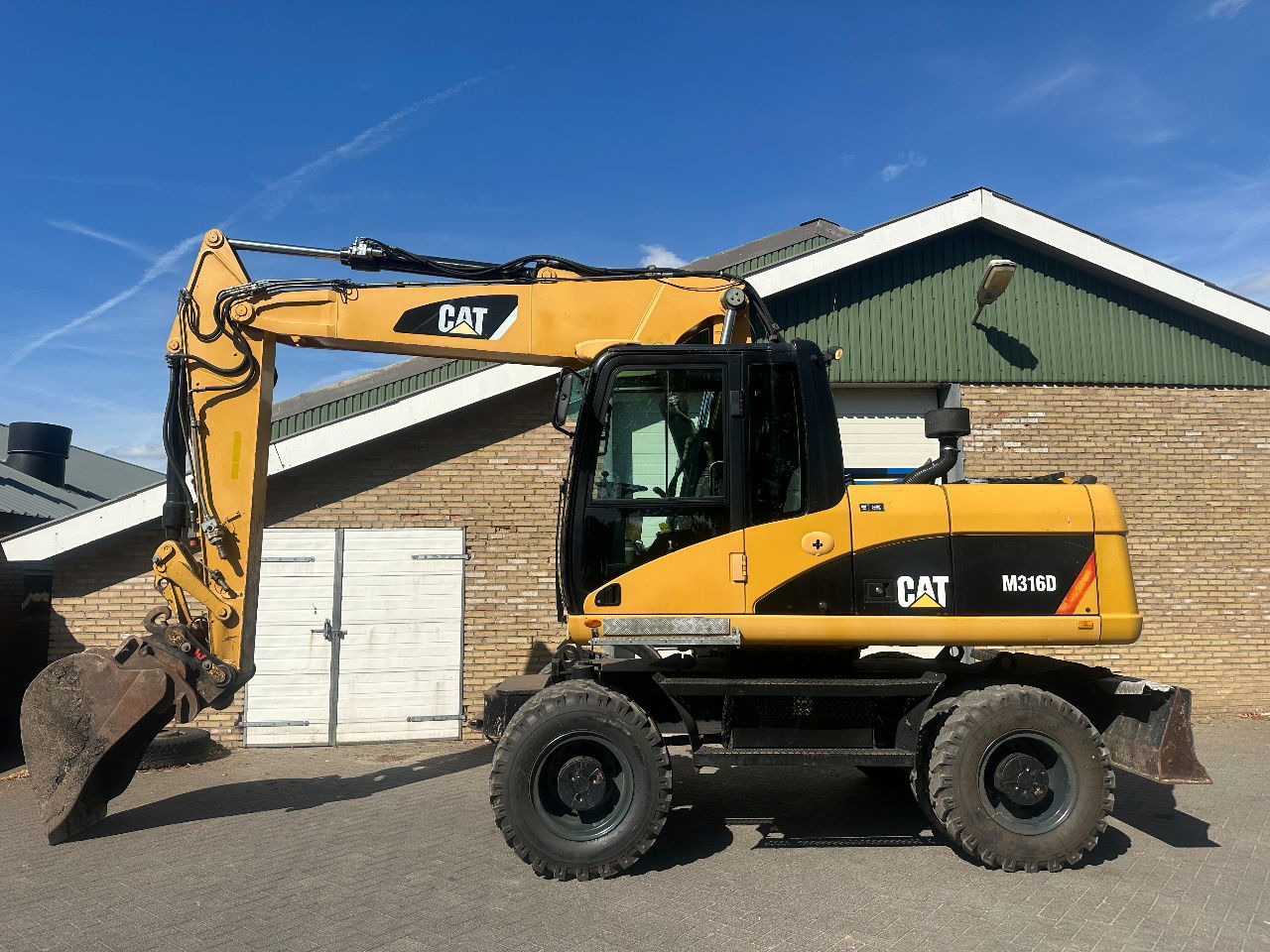 Caterpillar M316D - Cargadora de ruedas: foto 1 Caterpillar M316D - Cargadora de ruedas: foto 1