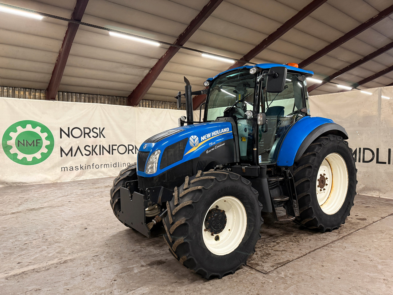 New Holland T5.115 EC - Tractor: foto 1 New Holland T5.115 EC - Tractor: foto 1