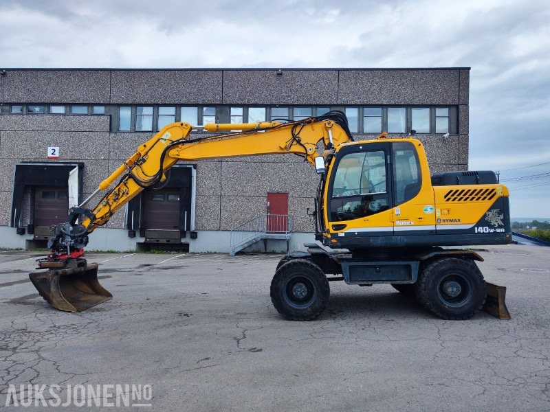 2016 Hyundai R140W-9 hjulgraver med leddet bom, tiltrotator og pusseskuff - Excavadora: foto 1 2016 Hyundai R140W-9 hjulgraver med leddet bom, tiltrotator og pusseskuff - Excavadora: foto 1