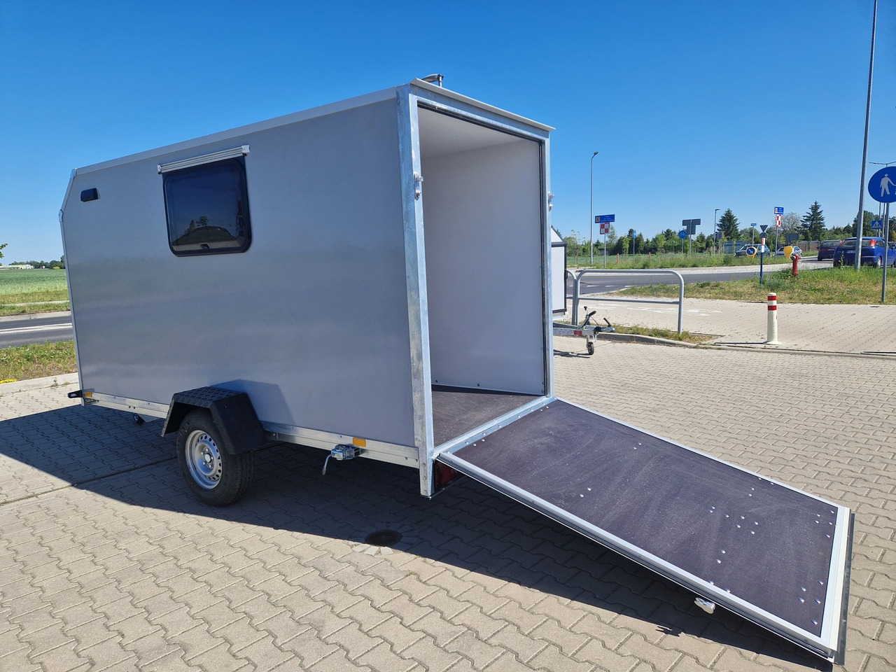 Przyczepa kempingowa Motocamp dla motocykla - Caravana: foto 1 Przyczepa kempingowa Motocamp dla motocykla - Caravana: foto 1