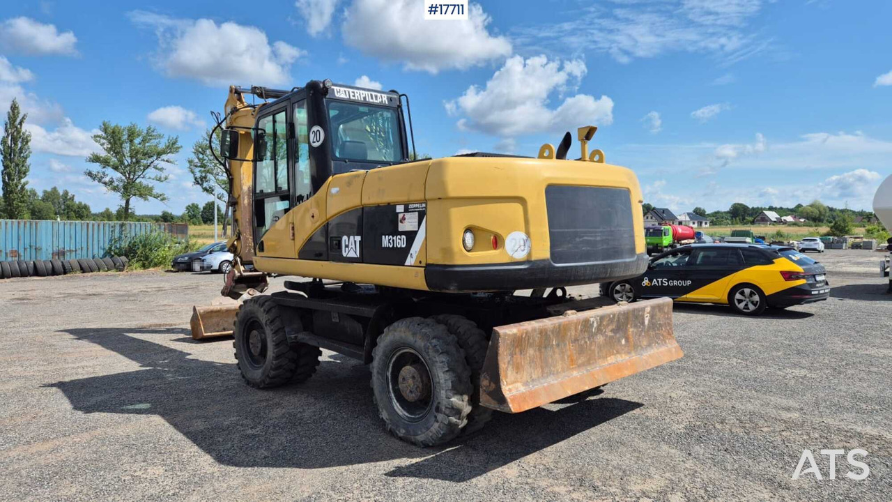 Excavadora de ruedas 2008 CAT M316D: foto 9