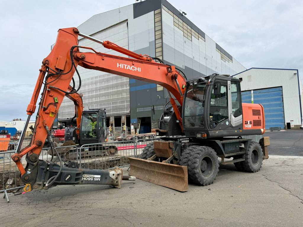 Hitachi ZX 140 W-3 - Excavadora de ruedas: foto 1 Hitachi ZX 140 W-3 - Excavadora de ruedas: foto 1