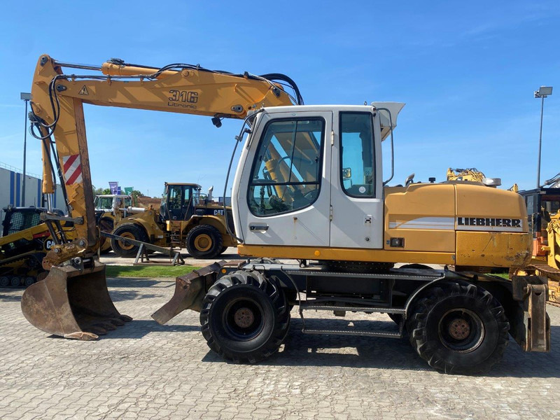 Liebherr A316 Litronic A 316 litronic - Excavadora de ruedas: foto 2 Liebherr A316 Litronic A 316 litronic - Excavadora de ruedas: foto 2