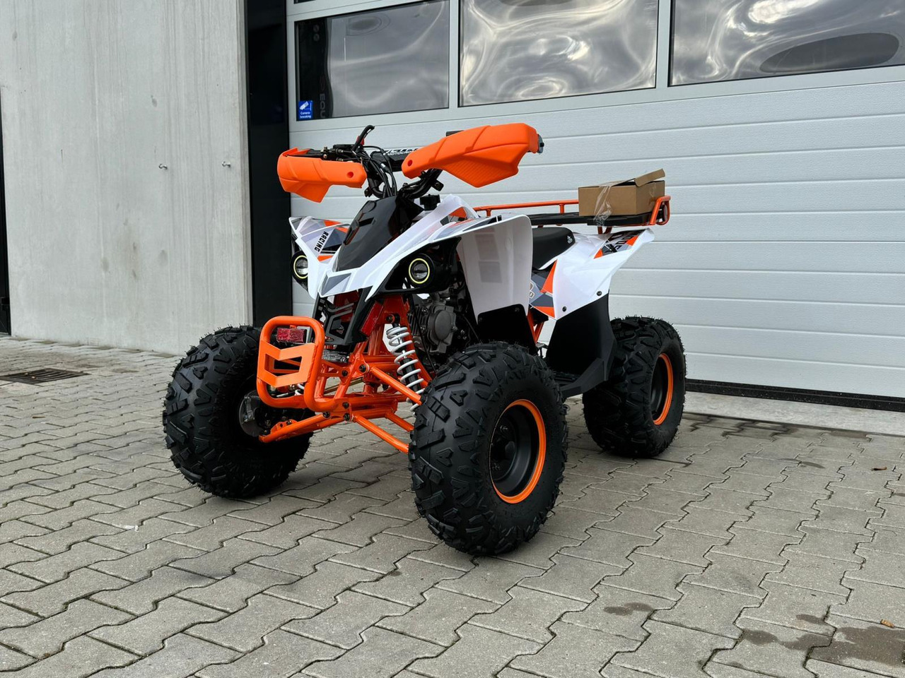 Quad UltraMotocross 125cc (oranje) - Cuadrimoto: foto 1 Quad UltraMotocross 125cc (oranje) - Cuadrimoto: foto 1