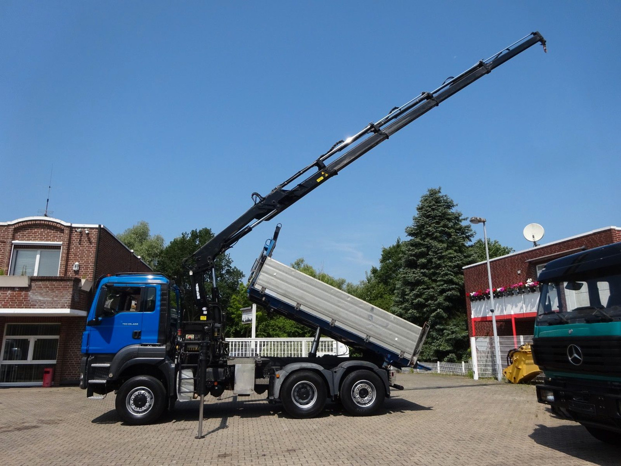 MAN 28.400 TGS 3Skipper+HIAB 166 E-4 HIPRPO 6x4-4 - Camión volquete, Camión grúa: foto 2 MAN 28.400 TGS 3Skipper+HIAB 166 E-4 HIPRPO 6x4-4 - Camión volquete, Camión grúa: foto 2