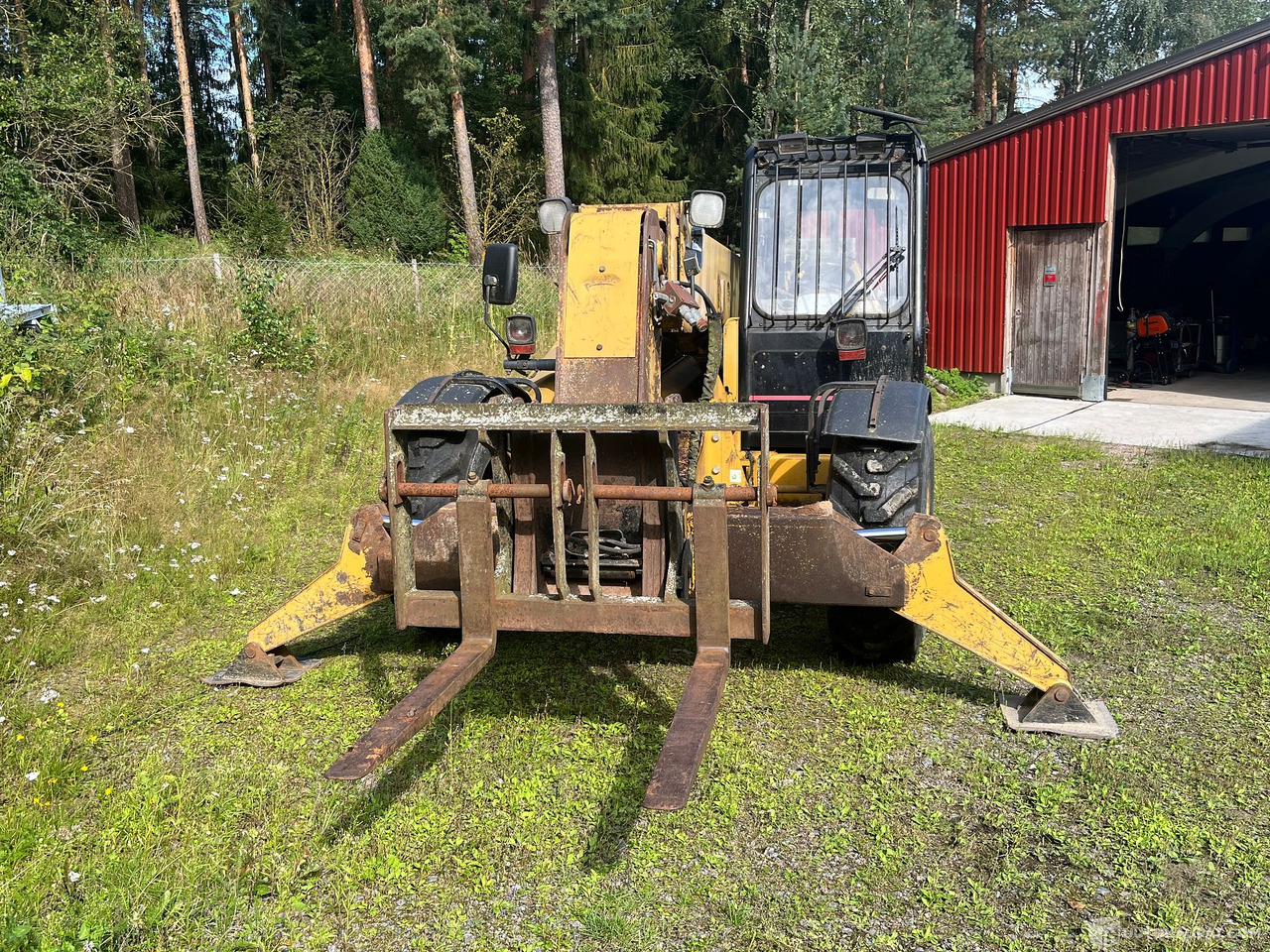Caterpillar TH63, kurottaja piikeillä ja kauhalla, 2002, Loppi - Maquinaria agrícola: foto 4 Caterpillar TH63, kurottaja piikeillä ja kauhalla, 2002, Loppi - Maquinaria agrícola: foto 4