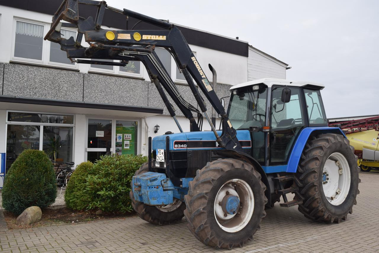 New Holland 8340 - Tractor: foto 1 New Holland 8340 - Tractor: foto 1