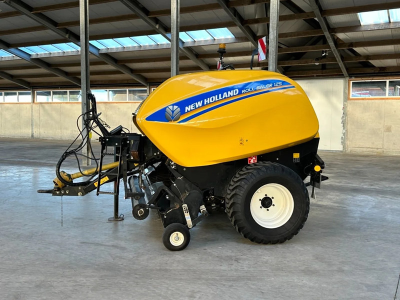 New Holland Roll baler 125 - Cosechadora: foto 2 New Holland Roll baler 125 - Cosechadora: foto 2