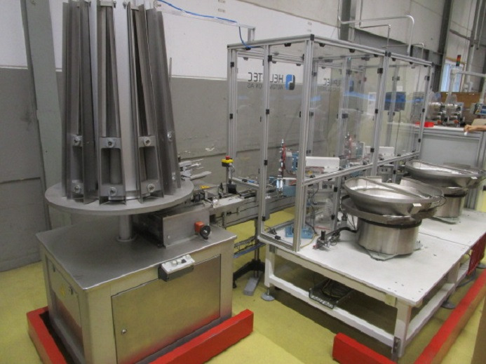 DECKEL ETIKETTIER ANLAGE SCHLEUTER GU 2 DO MIT 2xLÖFFELEINLEGESTATIONEN - Maquinaria de embalaje: foto 1 DECKEL ETIKETTIER ANLAGE SCHLEUTER GU 2 DO MIT 2xLÖFFELEINLEGESTATIONEN - Maquinaria de embalaje: foto 1