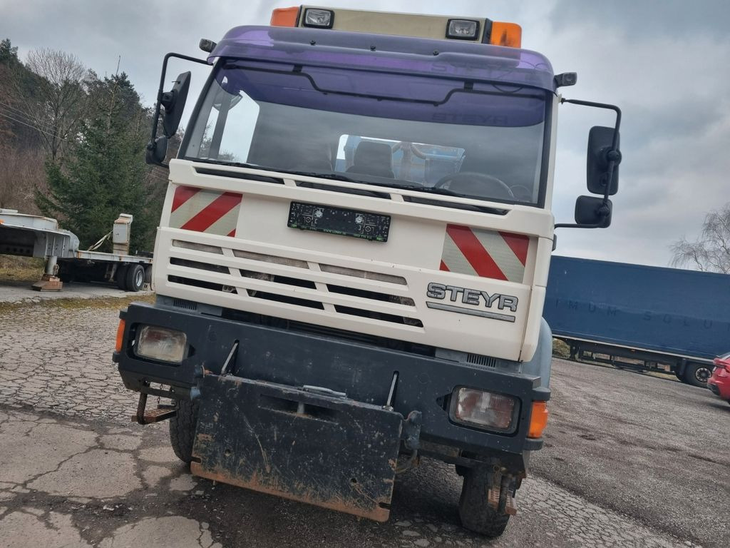 MAN (STEYR) 18.284 4x4 abrollkipper - Camión multibasculante: foto 2 MAN (STEYR) 18.284 4x4 abrollkipper - Camión multibasculante: foto 2