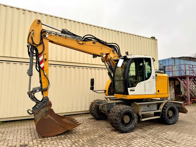 Liebherr A914 Compact / 2017 BJ / 9.979 H / OilQuick - Excavadora de ruedas: foto 1 Liebherr A914 Compact / 2017 BJ / 9.979 H / OilQuick - Excavadora de ruedas: foto 1