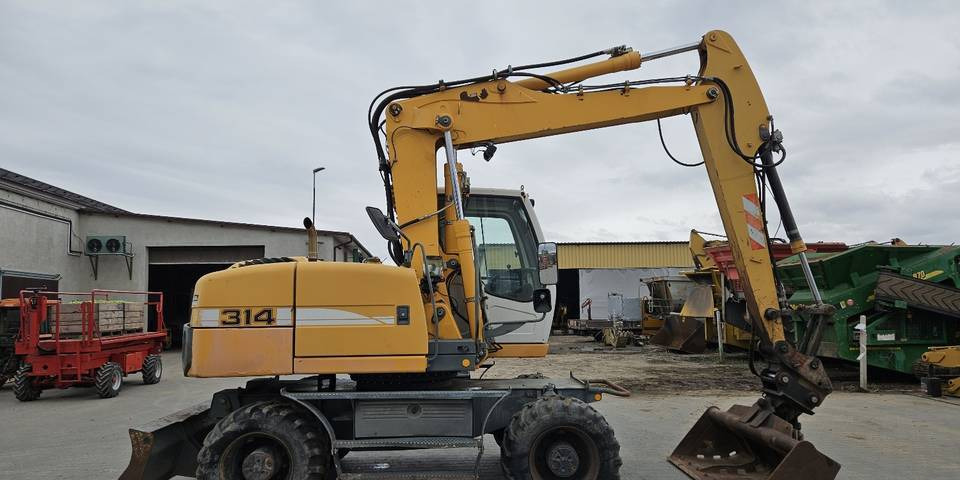 Koparka kołowa Liebherr A314 Litronic 9350 h 4 łyżki kołówka - Excavadora de ruedas: foto 5 Koparka kołowa Liebherr A314 Litronic 9350 h 4 łyżki kołówka - Excavadora de ruedas: foto 5