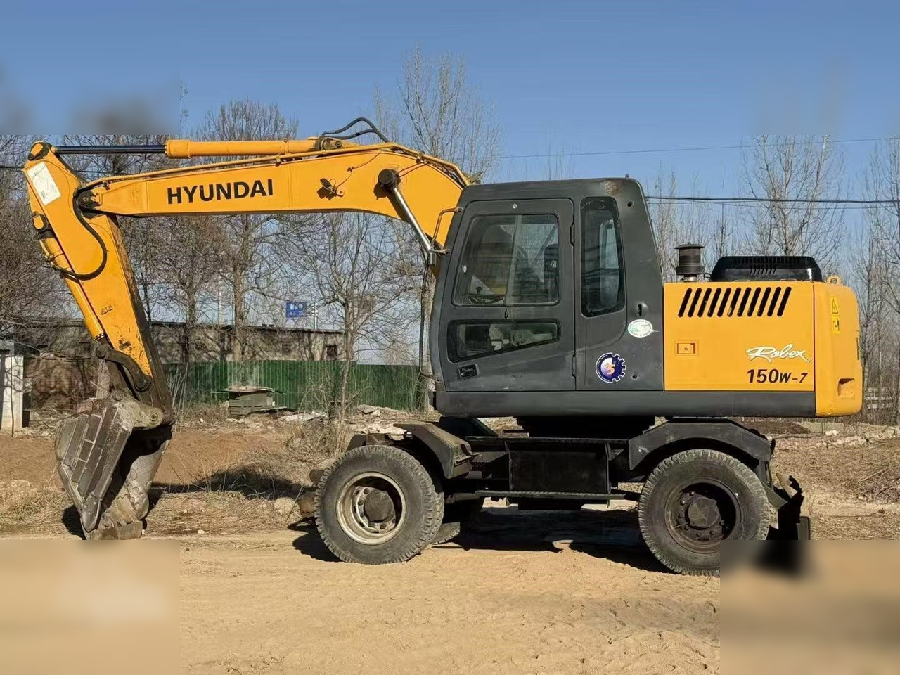 HYUNDAI ROBEX 150W-7A - Excavadora de ruedas: foto 1 HYUNDAI ROBEX 150W-7A - Excavadora de ruedas: foto 1