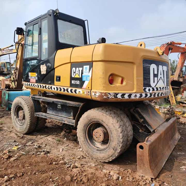 Used Digger Cat 315 Construction Machinery Construction Digger Used Cat 315 Cheap Excavator - Excavadora de ruedas: foto 1 Used Digger Cat 315 Construction Machinery Construction Digger Used Cat 315 Cheap Excavator - Excavadora de ruedas: foto 1