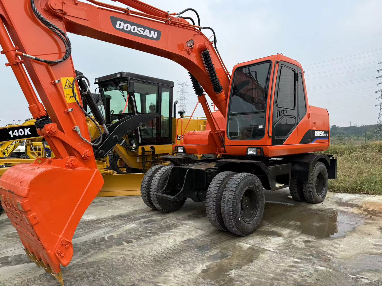 DOOSAN DH150W-7 - Excavadora de ruedas: foto 1 DOOSAN DH150W-7 - Excavadora de ruedas: foto 1