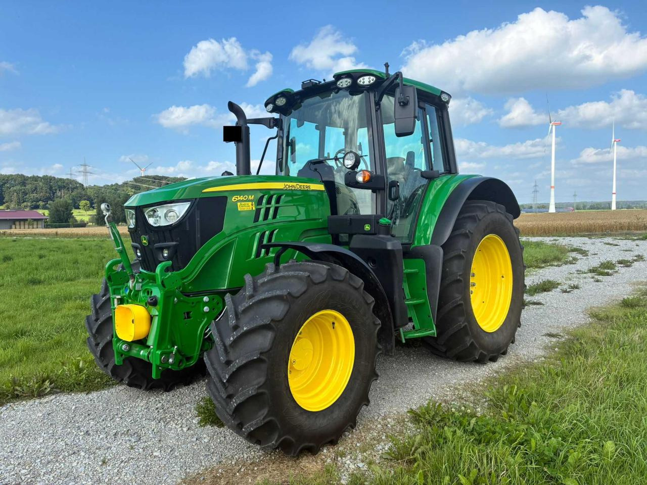 John Deere 6140M - Tractor: foto 1 John Deere 6140M - Tractor: foto 1