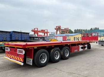TITAN Flatbed Tri Axle Truck Trailer for Sale in Tanzania - Semirremolque plataforma/ Caja abierta: foto 3 TITAN Flatbed Tri Axle Truck Trailer for Sale in Tanzania - Semirremolque plataforma/ Caja abierta: foto 3
