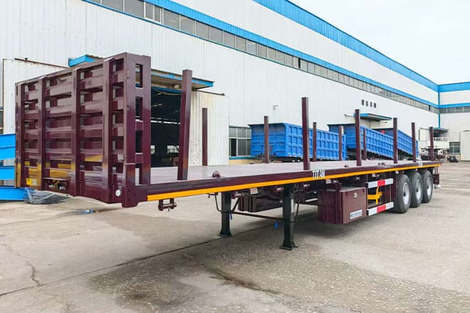 TITAN New 3 Axle Flatbed Trailers for Sale in Malawi - Semirremolque plataforma/ Caja abierta: foto 1 TITAN New 3 Axle Flatbed Trailers for Sale in Malawi - Semirremolque plataforma/ Caja abierta: foto 1
