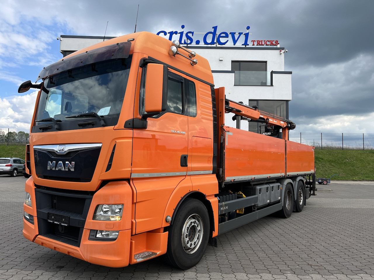 MAN TGX 26.480 6x2 Atlas 145.2 Kran Baustoff AHK - Camión caja abierta, Camión grúa: foto 1 MAN TGX 26.480 6x2 Atlas 145.2 Kran Baustoff AHK - Camión caja abierta, Camión grúa: foto 1