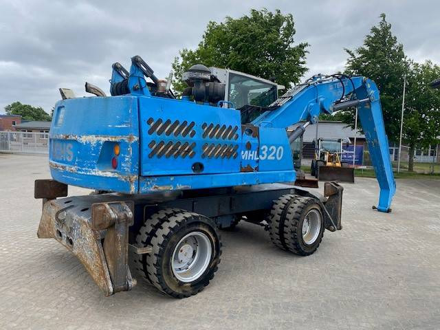 Fuchs MHL 320 (12005437) - Manipulador de materiales: foto 4 Fuchs MHL 320 (12005437) - Manipulador de materiales: foto 4