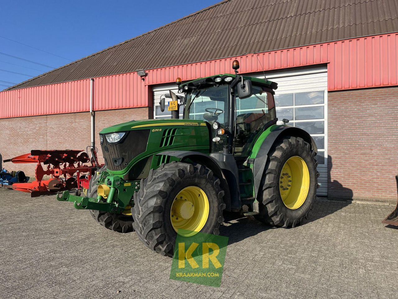John Deere 6210R - Tractor: foto 1 John Deere 6210R - Tractor: foto 1