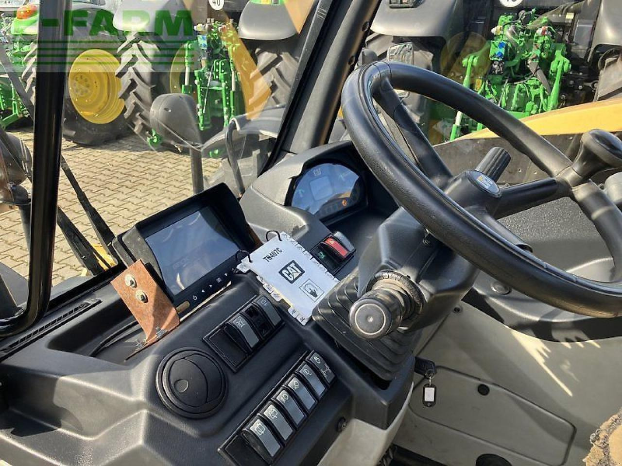 Manipulador telescópico Caterpillar th 407: foto 7