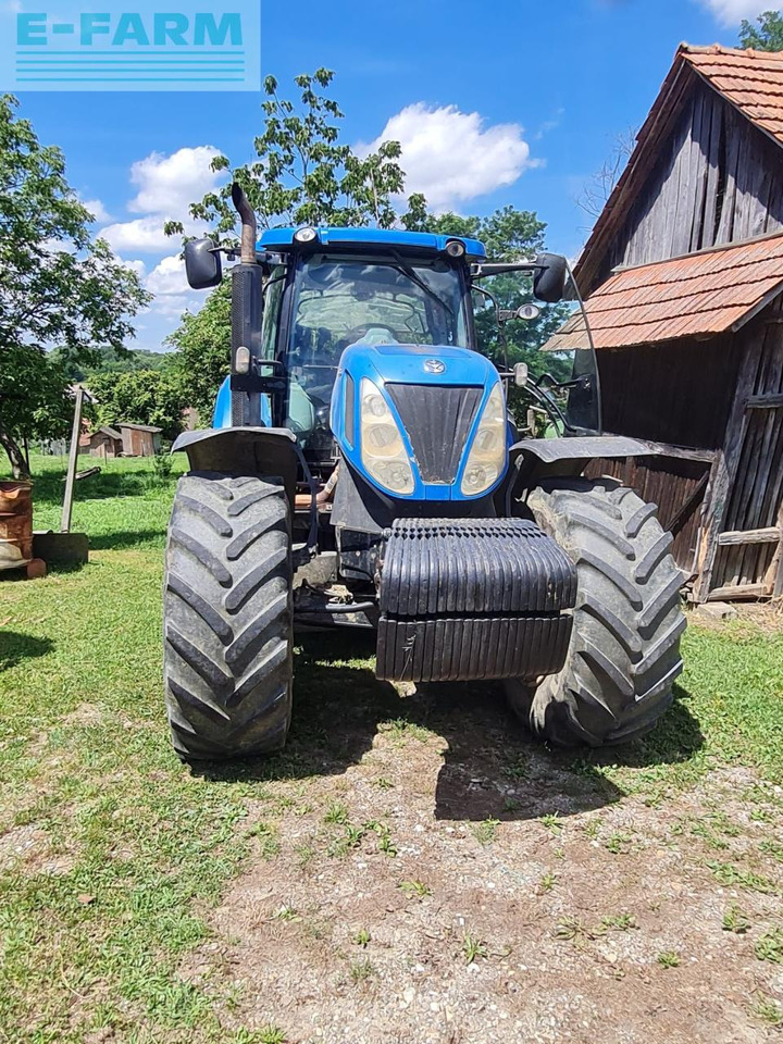 New Holland T7050 - Tractor: foto 1 New Holland T7050 - Tractor: foto 1
