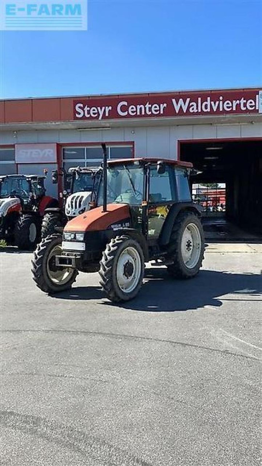 New Holland l65 - Tractor: foto 1 New Holland l65 - Tractor: foto 1