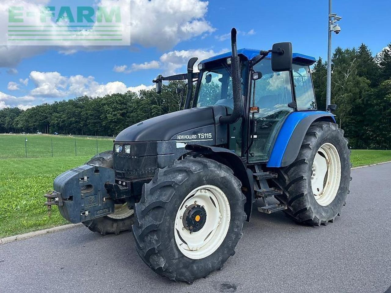 New Holland ts 115 - Tractor: foto 1 New Holland ts 115 - Tractor: foto 1