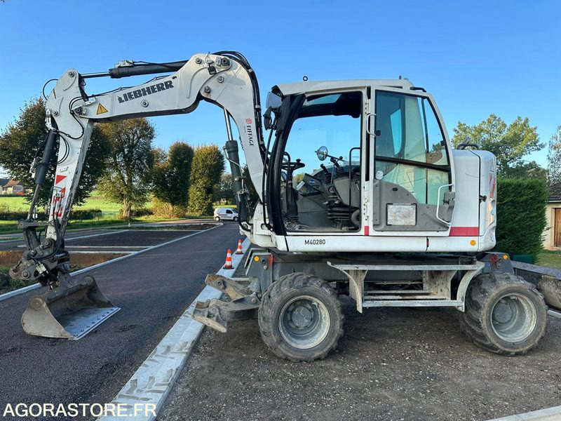PELLES SUR PNEUS - LIEBHERR - A910 COMPACT- 2014 / 10242 HEURES (M40280) - Excavadora: foto 1 PELLES SUR PNEUS - LIEBHERR - A910 COMPACT- 2014 / 10242 HEURES (M40280) - Excavadora: foto 1