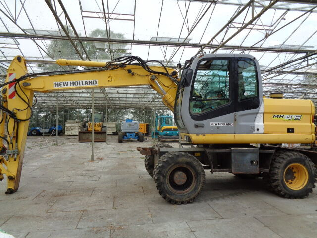 New Holland MH 4.6 - Excavadora de ruedas: foto 1 New Holland MH 4.6 - Excavadora de ruedas: foto 1