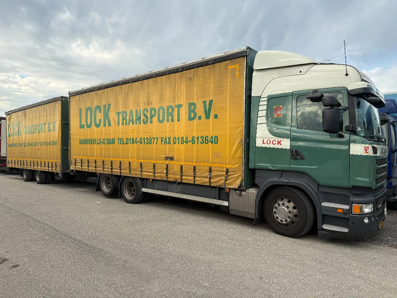 Scania R450 6X2 + DRACO AANHANGER 2010 TUV TILL 17-08-2026 - Camión lona: foto 1 Scania R450 6X2 + DRACO AANHANGER 2010 TUV TILL 17-08-2026 - Camión lona: foto 1