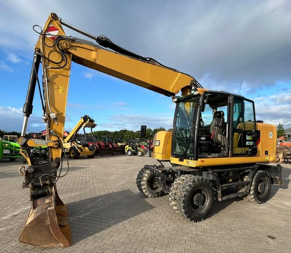 CAT M 318 F - Excavadora de ruedas: foto 1 CAT M 318 F - Excavadora de ruedas: foto 1