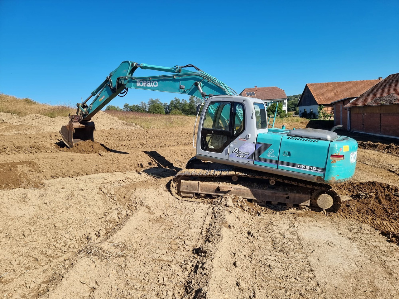 KOBELCO SK 210 NLC-6E - Excavadora de cadenas: foto 1 KOBELCO SK 210 NLC-6E - Excavadora de cadenas: foto 1