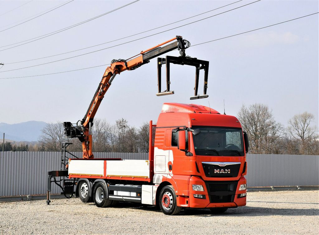 MAN TGX 26.440 Pritsche 6,60 m*TEREX 135.2-A11 - Camión grúa: foto 1 MAN TGX 26.440 Pritsche 6,60 m*TEREX 135.2-A11 - Camión grúa: foto 1