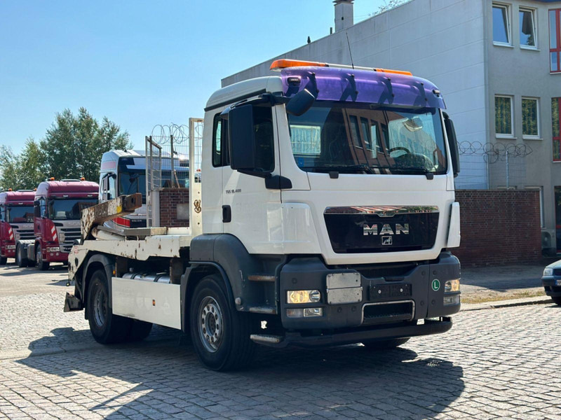 MAN TGS 18.400 Skip loader - Camión portacontenedor de cadenas: foto 1 MAN TGS 18.400 Skip loader - Camión portacontenedor de cadenas: foto 1