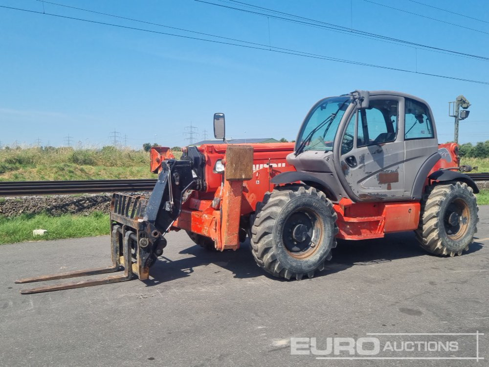 2012 Manitou MT1440 - Manipulador telescópico: foto 1 2012 Manitou MT1440 - Manipulador telescópico: foto 1
