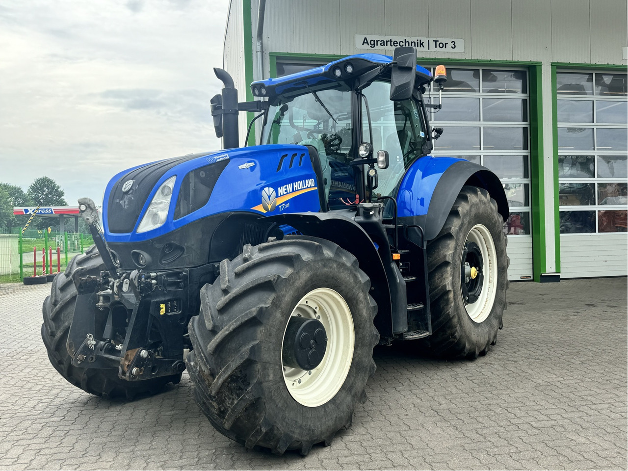 New Holland T7.315 - Tractor: foto 1 New Holland T7.315 - Tractor: foto 1