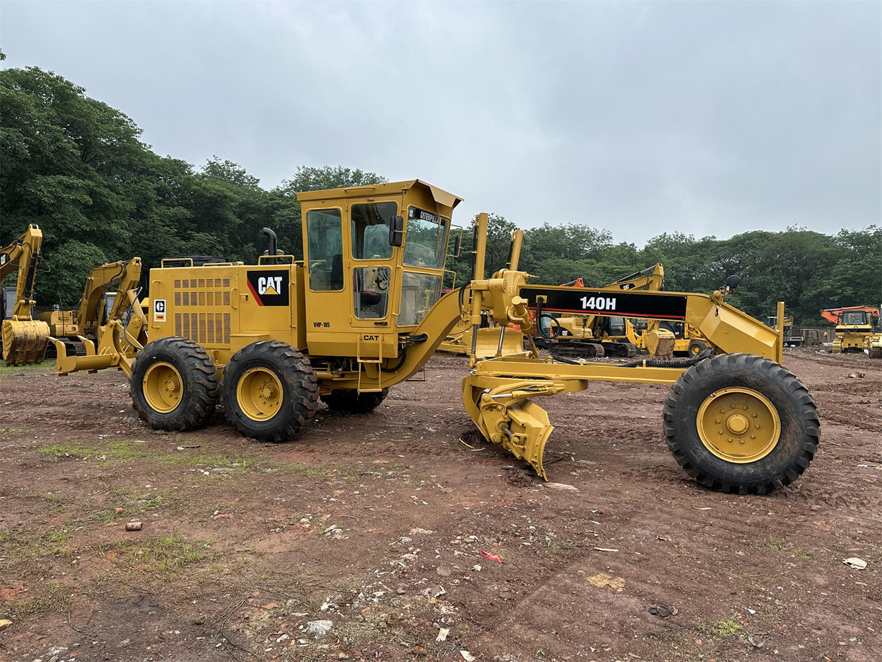 Grader CATERPILLAR 140H: foto 1