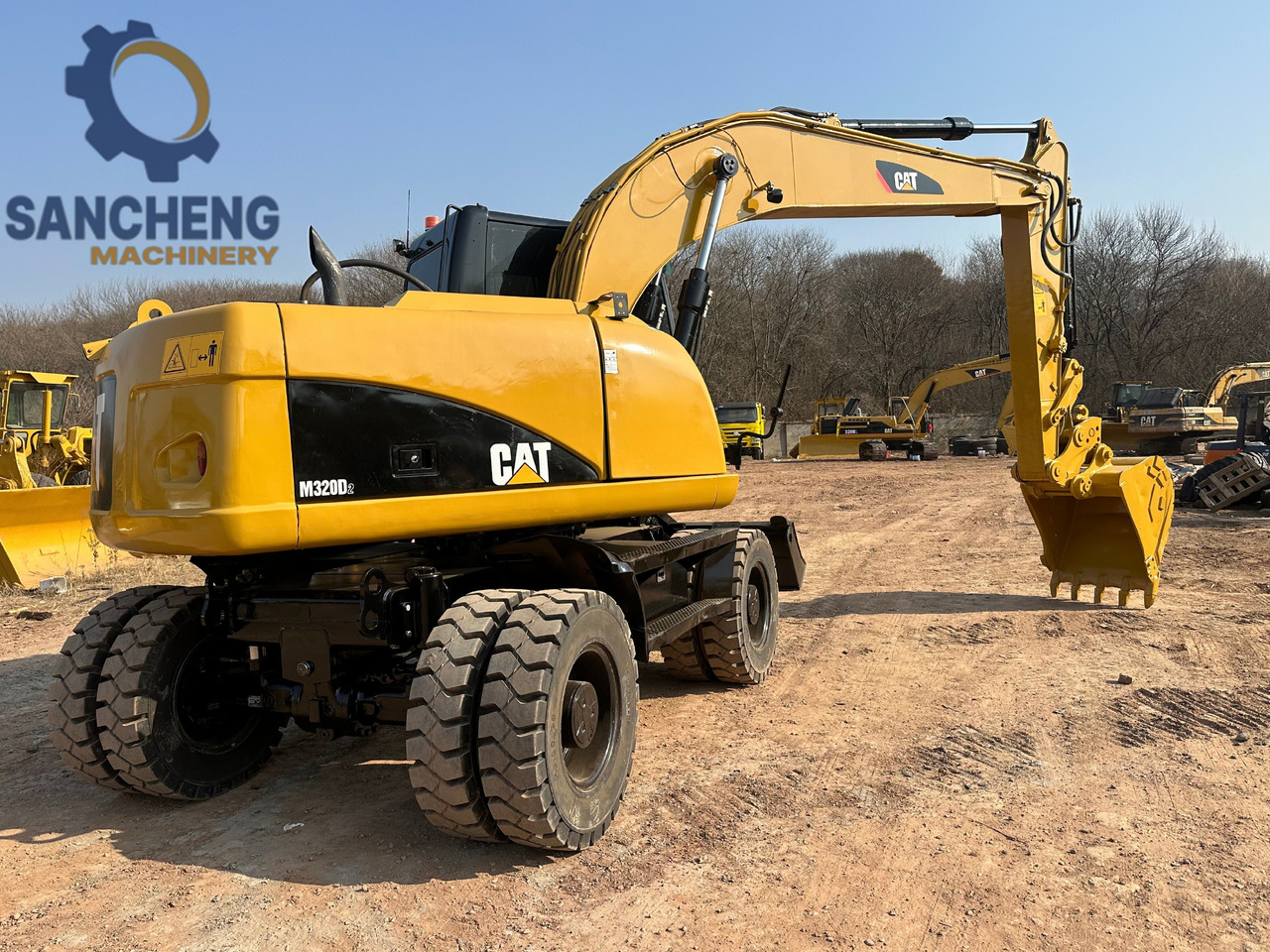 Excavadora de ruedas CATERPILLAR M320D2: foto 7