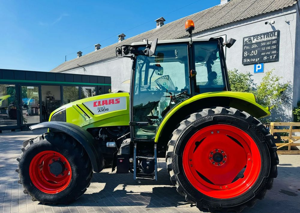 Claas Axos 330 - Tractor: foto 2 Claas Axos 330 - Tractor: foto 2